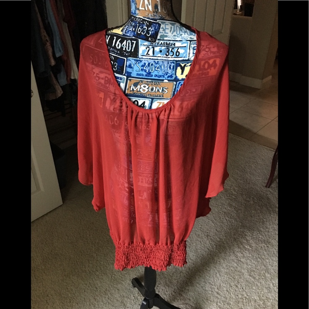 Red sheer blouse with fitted waist